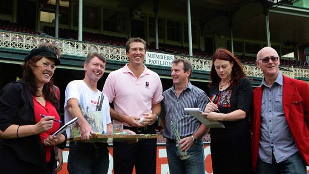 Glenn McGrath at the SCG yesterday with some of the 12 artists who will be painting live works on the first three days of the second Test against India. From left are Helen Alker, Michael Bell, Glenn McGrath, Luke Harvey, Kristen Smith and Leo Robba.