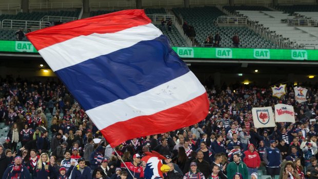 New South Wales's team? Not quite: Sydney Roosters fans after their win over the Broncos.