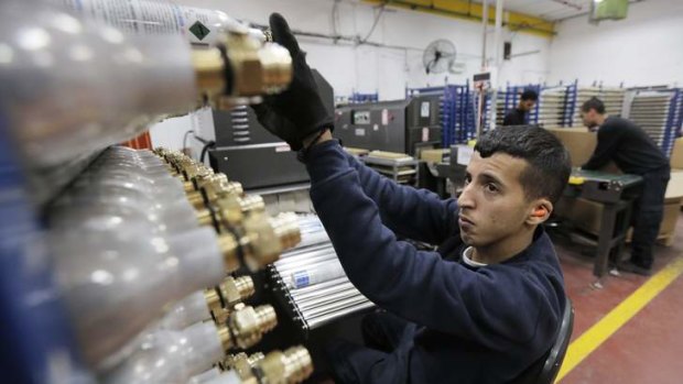 A Palestinian worker in a SodaStream factory in the West Bank.