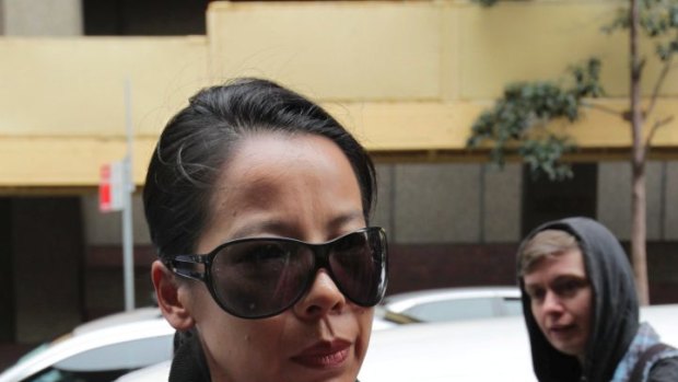 Kathy Lin, the wife of alleged killer Robert Xie, arrives at Sydney's Supreme Court.