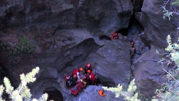 Rescue crews work with Dion in the gorge.