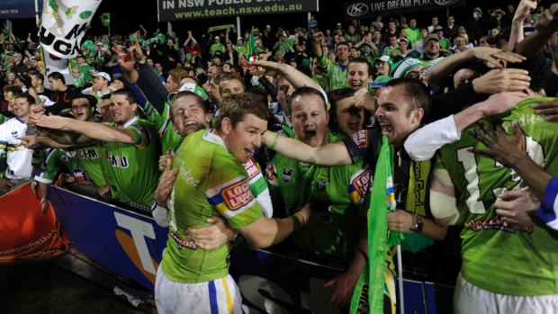 Glen Buttriss mobbed by fans in the 2010 NRL finals series.