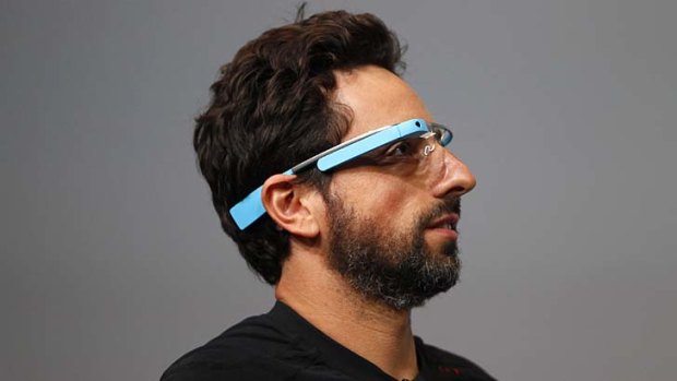 Google's Sergey Brin shows off Google Glass earlier this year.