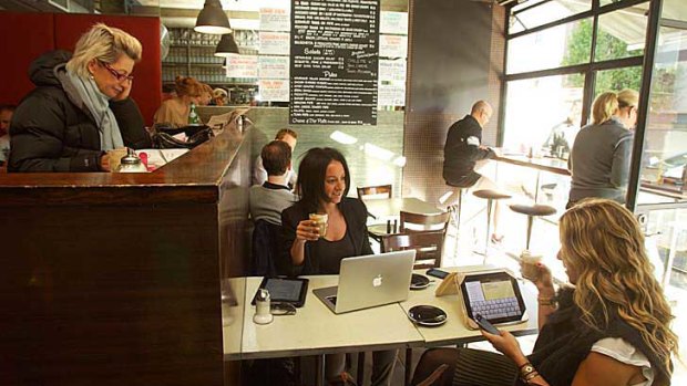 Deals with meals: Public relations consultant Natalie Frid (centre) loves doing business over coffee and a snack at a South Yarra cafe rather than her office,  ‘and the rent is very reasonable’.