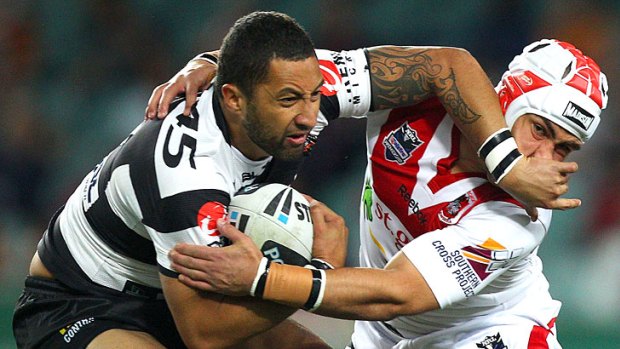 Lean trot &#8230; Benji Marshall, left, is tackled by Jamie Soward, who has rapidly dropped in value.