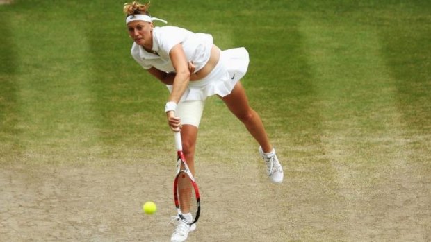 Petra Kvitova serves to Eugnie Bouchard during Saturday's women's final.