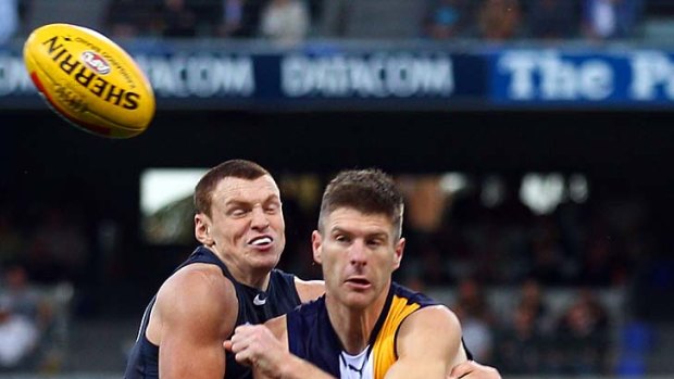 Beau Waters tangles with Mitch Robinson of the Blues during the first semi-final last week.