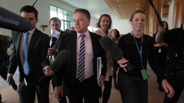 Media follows Labor MP Joel Fitzgibbon through Parliament House on Wednesday.