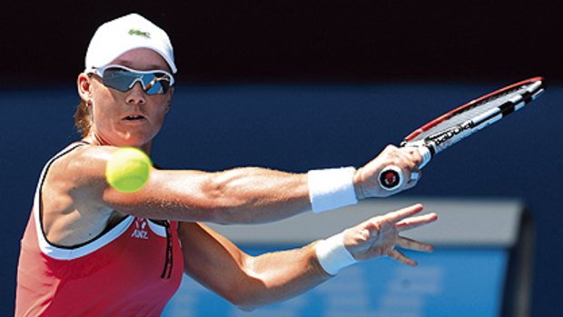 One down  ... Australia’s great women’s hope, Sam Stosur, was made to fight for her three-set win against China’s world No.191 and qualifier Xinyun Han on Rod Laver Arena yesterday. Stosur says she’s now more relaxed and meets the unseeded German Kristina Barrois next round.