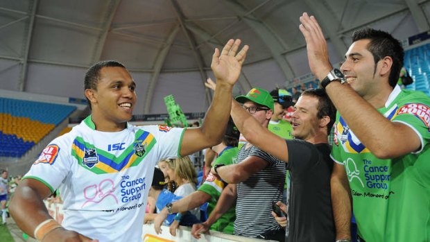 Travis Waddell celebrates with Canberra fans last year. Waddell has been looking for an NRL contract since being released by the Raiders at the end of 2012.