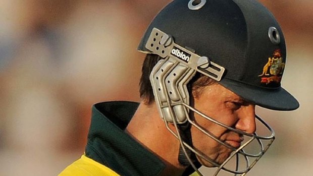 Ricky Ponting walks back dejected despite scoring a century in the World Cup quarter-final.