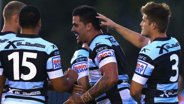 Hot property: Cronulla's Andrew Fifita celebrates scoring a try against Wests Tigers in a trial at Remondis Stadium on Saturday night.