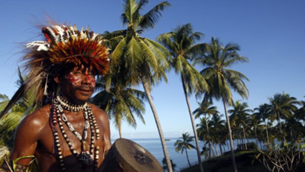 Dressing down ... a Tufi man epitomises the warm welcome on shore.