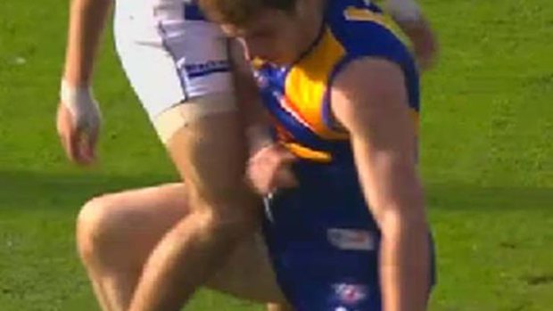 Contentious contact: Luke Shuey received two weeks suspension for this clash with Lindsay Thomas.