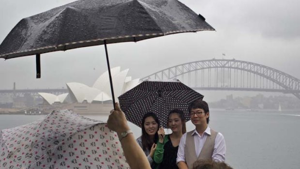 Wild weather ... Sydney was drenched with rain yesterday.