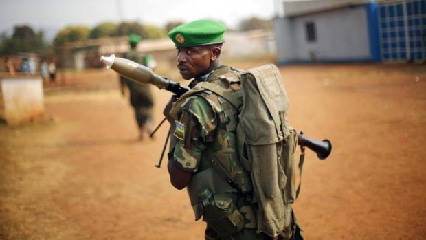 On patrol: A Rwandan soldier from the African Union peacekeepers on the streets of Bangui.