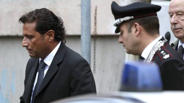 Accused ... Francesco Schettino leaves at the end of the hearing.