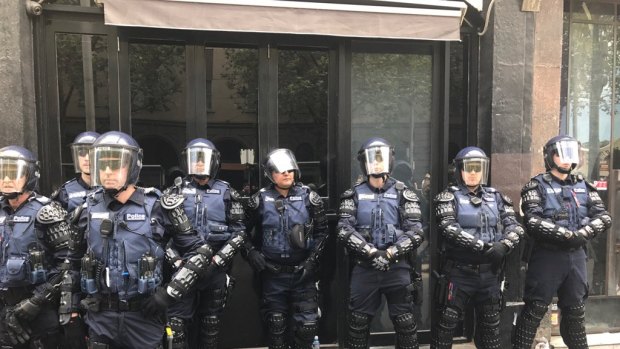 Riot police assemble ahead of a Anti/Pro Trump rally in Melbourne