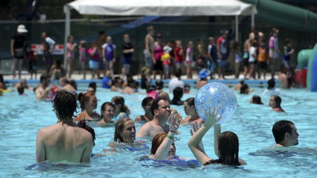 Canberrans escaping the heat at Big Splash in Macquarie.