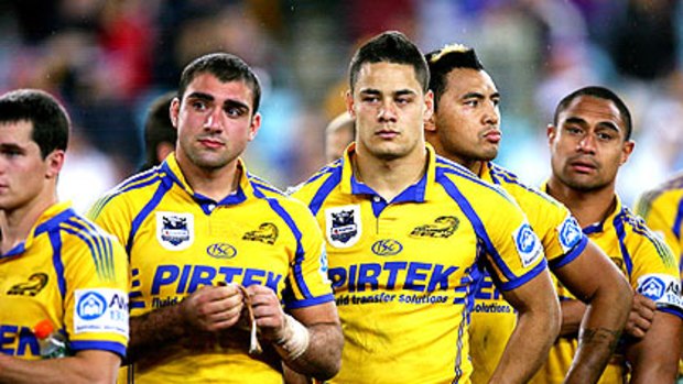 Parramatta players feel the disappointment of a grand final loss.