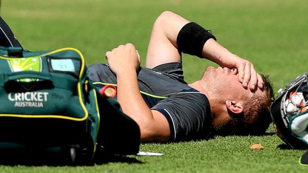 Agony ... David Warner after being struck on the left hand by Mitchell Johnson in Perth last month.