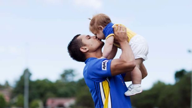 Family affair &#8230; Parramatta's Marmin Barba with his inspiration, 10-month-old daughter Peityn.