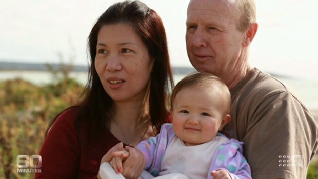 David and Wendy Farnell with baby Pipah on 60 MInutes.