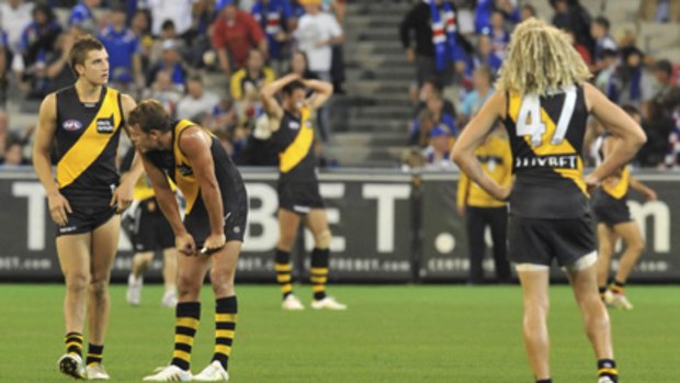 Richmond players after the crushing loss to the Western Bulldogs.
