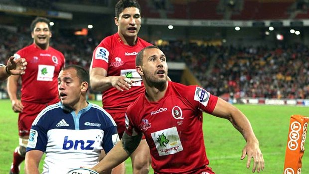 Quade Cooper scores in the corner for the Reds.