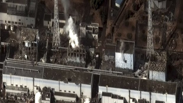 A satellite image shows the extent of damage to the Fukushima nuclear plant.