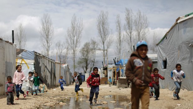 Syrian refugee children at the camp in al-Marj. Although it has intervened to ensure adequate health care, the Lebanese government is trying to keep the crisis at a distance.