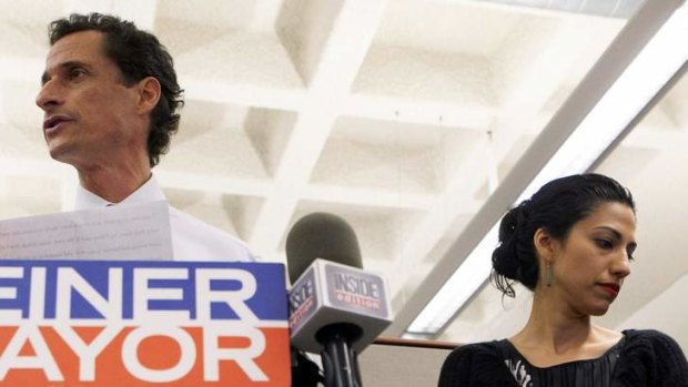 New York mayoral candidate Anthony Weiner and his wife Huma Abedin attend a news conference in New York.