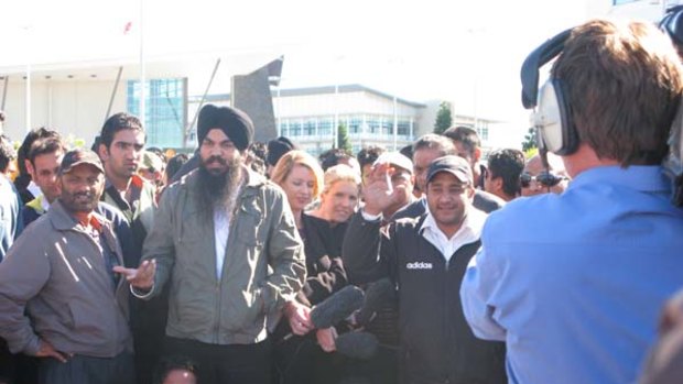 Furious cabbies rally outside Brisbane Airport.