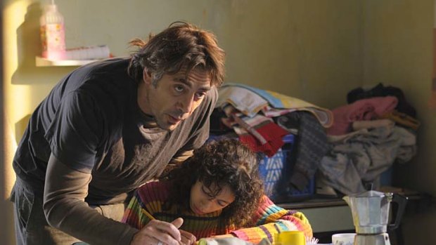 Uxbal (Javier Bardem) dotes on his daughter Ana (Hanaa Bouchaib) in Spanish drama Biutiful.