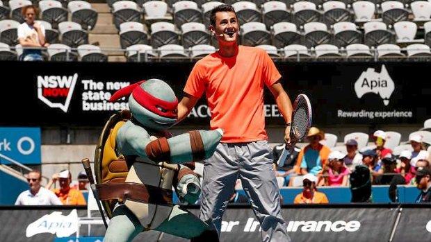 Big kid: Bernard Tomic of Australia takes part in a Kids Day activity during day two of the Sydney International.