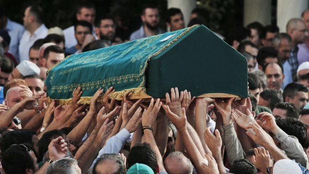 Mourners carry the coffin of victim Muhammed Eymen Demirci in Istanbul's Basaksehir neighbourhood.