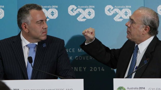 Joe Hockey and Angel Gurria speaking at a G20 press conference.
