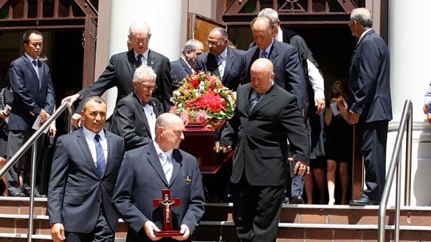 Funeral: Mourners carry the coffin of Pat Reilly at Our Lady of Dolours Church, Chatswood.
