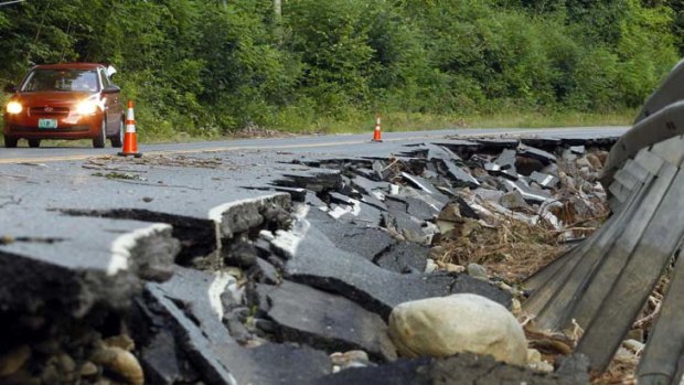 Big damage bill ... a section of Route 112 that was washed out during Hurricane Irene in Halifax, Vermont.