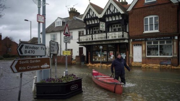 Flooded: The central square in the village of Datchet in Berkshire, southern England.