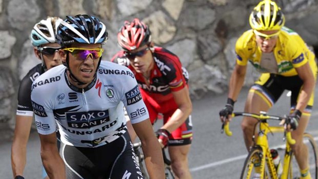 Aggressive rider ... Alberto Contador attacks on the ascent of the Col du Telegraph with Andy Schleck, Cadel Evans and Thomas Voeckler.