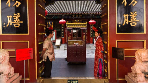 The Fangshan Imperial Restaurant welcome customers at Beihai Park in Beijing.