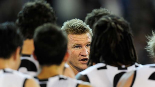 Collingwood coach Nathan Buckley addresses his underperforming charges during their loss to Carlton in round three.