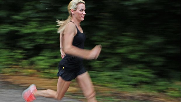 In action ... Suzy Favor Hamilton out for a run in July this year.