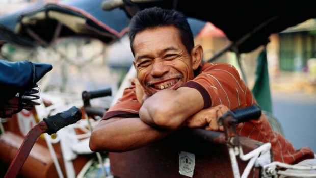 A rickshaw driver.