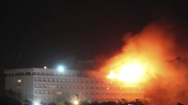 Death from above ... NATO helicopters fired missiles at Kabul's Intercontinental Hotel, which had been occupied by heavily armed Taliban rebels, killing three.