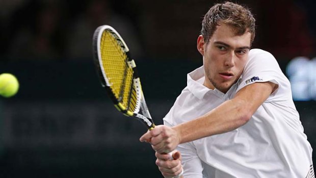 Poland's Jerzy Janowicz in action against Andy Murray of Britain during the Paris Masters tennis tournament. Janowicz beat Murray 5-7 7-6 (7-4) 6-2.