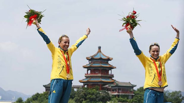 Triumphant ... Emma Snowsill and Emma Moffatt at Beijing.