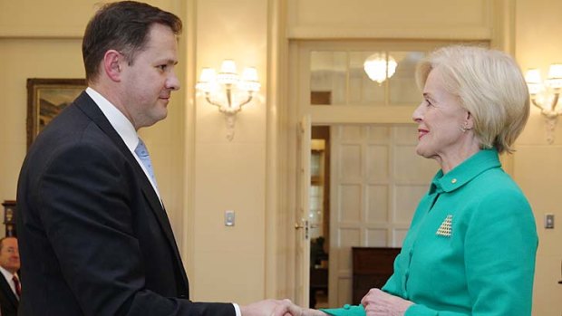 Ed Husic, Parliamentary Secretary to the Prime Minister and Parliamentary Secretary for Broadband, during the swearing-in ceremony at Government House with Governor-General Quentin Bryce.