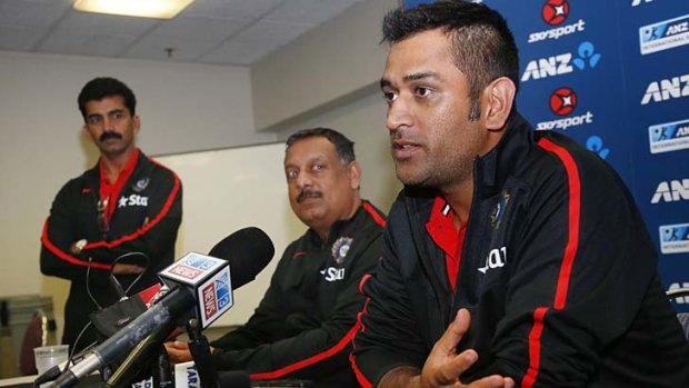 India's cricket captain Mahendra Singh Dhoni talks to the media after the team's arrival in Auckland on Monday.
